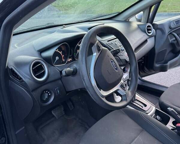 Черный Форд Фиеста, объемом двигателя 1.6 л и пробегом 130 тыс. км за 8400 $, фото 21 на Automoto.ua