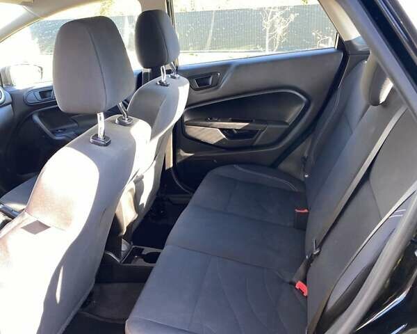 Черный Форд Фиеста, объемом двигателя 1.6 л и пробегом 115 тыс. км за 8700 $, фото 13 на Automoto.ua