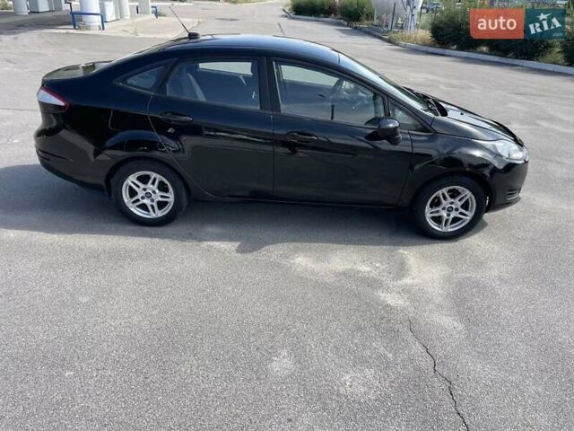 Черный Форд Фиеста, объемом двигателя 1.6 л и пробегом 97 тыс. км за 6777 $, фото 4 на Automoto.ua