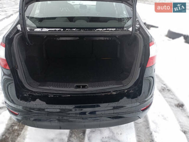 Черный Форд Фиеста, объемом двигателя 1.6 л и пробегом 80 тыс. км за 8000 $, фото 12 на Automoto.ua