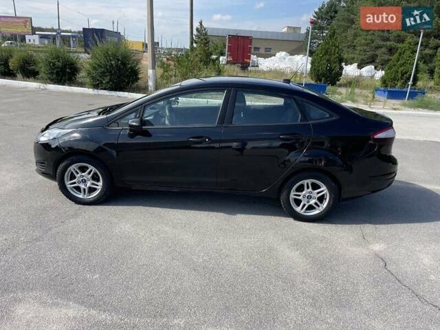 Черный Форд Фиеста, объемом двигателя 1.6 л и пробегом 97 тыс. км за 6777 $, фото 2 на Automoto.ua