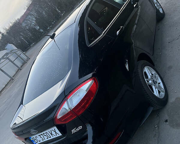 Черный Форд Фиеста, объемом двигателя 1.6 л и пробегом 56 тыс. км за 9300 $, фото 2 на Automoto.ua