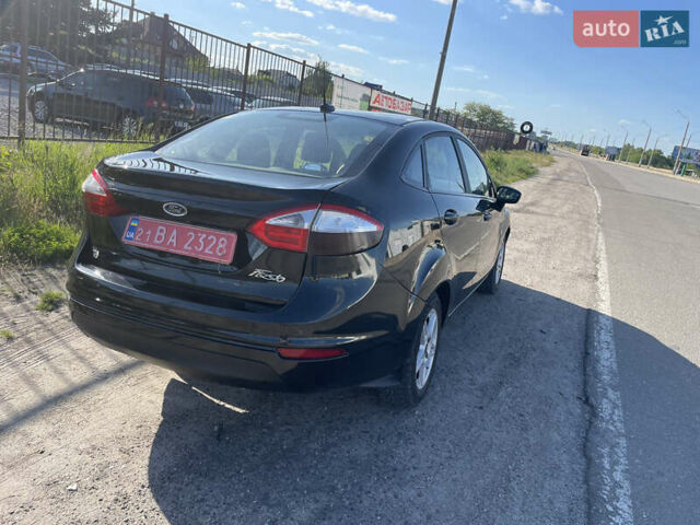 Черный Форд Фиеста, объемом двигателя 1.6 л и пробегом 98 тыс. км за 6777 $, фото 9 на Automoto.ua