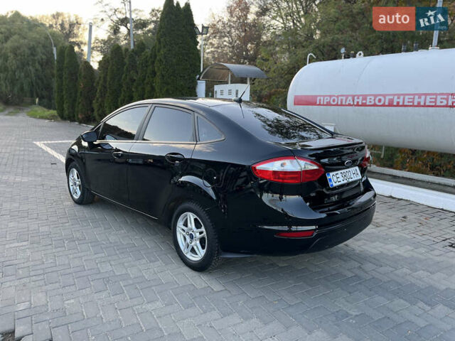 Черный Форд Фиеста, объемом двигателя 1.6 л и пробегом 195 тыс. км за 8299 $, фото 7 на Automoto.ua