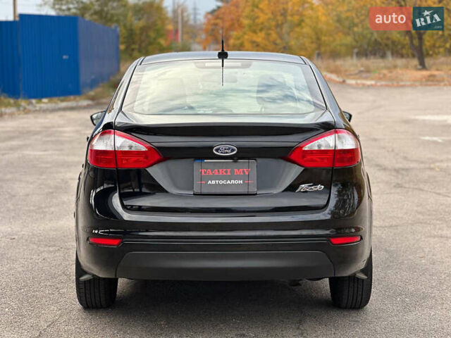 Черный Форд Фиеста, объемом двигателя 1.6 л и пробегом 298 тыс. км за 6500 $, фото 4 на Automoto.ua
