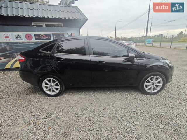 Черный Форд Фиеста, объемом двигателя 1.6 л и пробегом 84 тыс. км за 8100 $, фото 3 на Automoto.ua
