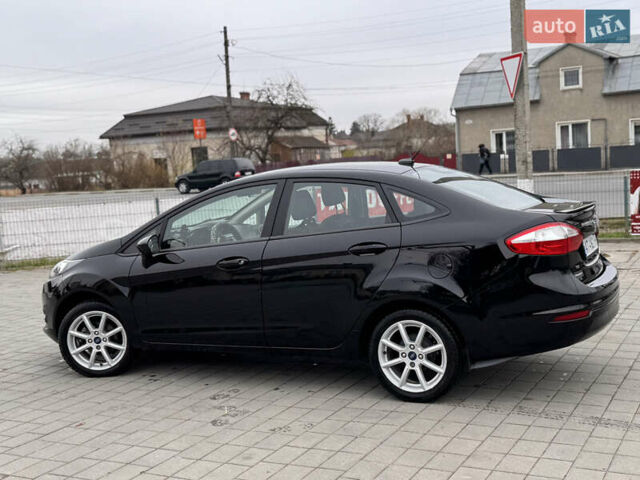 Черный Форд Фиеста, объемом двигателя 1.6 л и пробегом 77 тыс. км за 9500 $, фото 2 на Automoto.ua