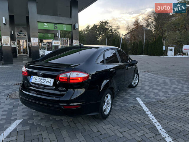 Черный Форд Фиеста, объемом двигателя 1.6 л и пробегом 195 тыс. км за 8299 $, фото 2 на Automoto.ua
