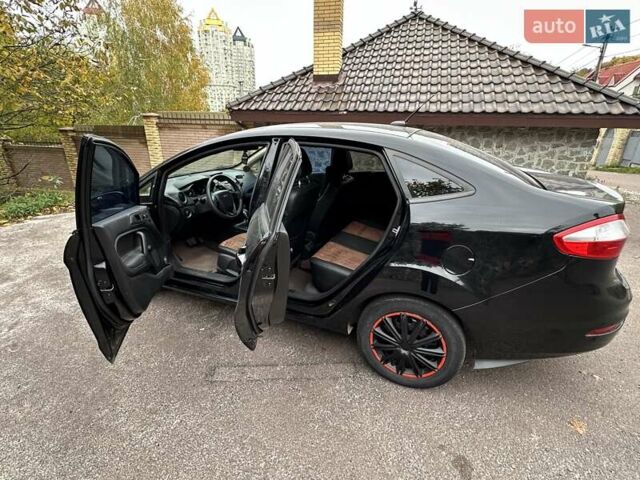 Черный Форд Фиеста, объемом двигателя 1.6 л и пробегом 77 тыс. км за 10500 $, фото 10 на Automoto.ua