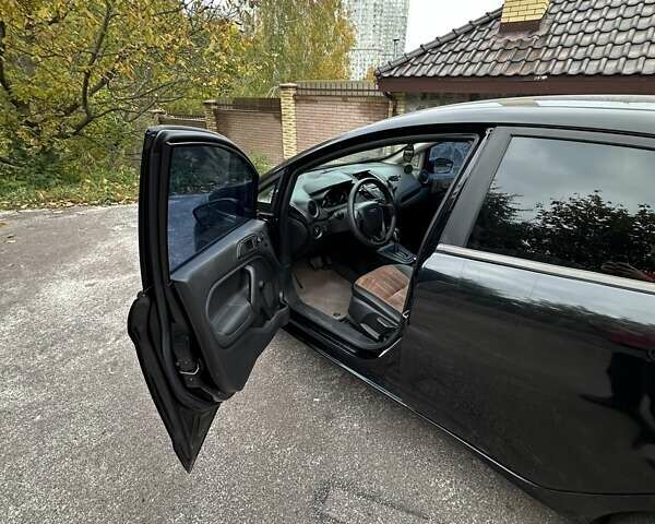 Черный Форд Фиеста, объемом двигателя 1.6 л и пробегом 77 тыс. км за 10500 $, фото 11 на Automoto.ua