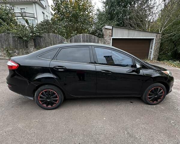 Черный Форд Фиеста, объемом двигателя 1.6 л и пробегом 77 тыс. км за 10500 $, фото 2 на Automoto.ua