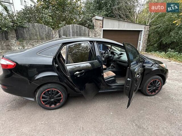 Черный Форд Фиеста, объемом двигателя 1.6 л и пробегом 77 тыс. км за 10500 $, фото 13 на Automoto.ua