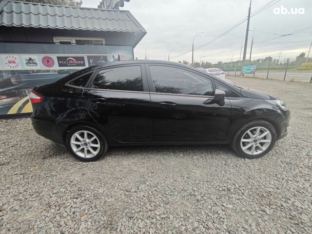 Чорний Форд Фієста, об'ємом двигуна 1.6 л та пробігом 84 тис. км за 8100 $, фото 3 на Automoto.ua