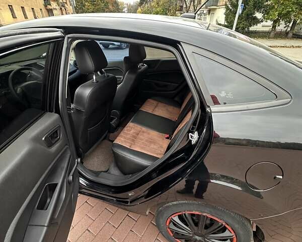 Черный Форд Фиеста, объемом двигателя 1.6 л и пробегом 77 тыс. км за 10500 $, фото 12 на Automoto.ua