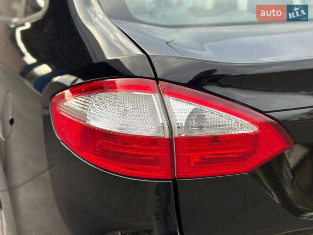 Черный Форд Фиеста, объемом двигателя 1.6 л и пробегом 298 тыс. км за 6500 $, фото 31 на Automoto.ua