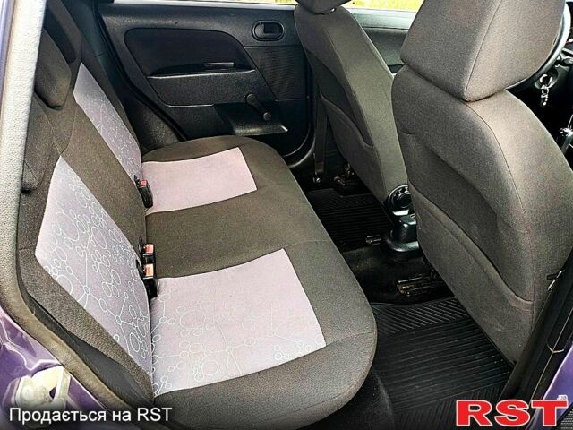 Форд Фиеста 2006 в Сумах на Automoto.ua Фиолетовый Форд Фиеста, объемом двигателя 1.3 л и пробегом 145 тыс. км за 3800 $, фото 6 на Automoto.ua