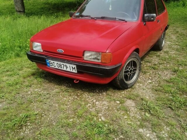 Красный Форд Фиеста, объемом двигателя 1.1 л и пробегом 84 тыс. км за 699 $, фото 1 на Automoto.ua