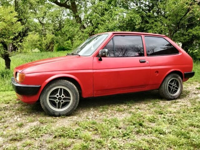 Красный Форд Фиеста, объемом двигателя 1.1 л и пробегом 84 тыс. км за 699 $, фото 2 на Automoto.ua