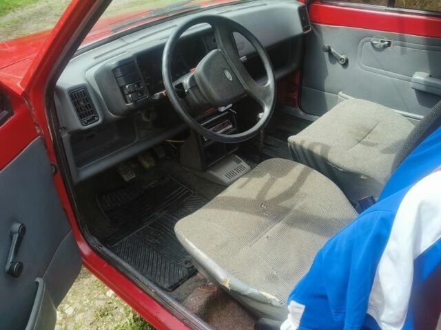 Красный Форд Фиеста, объемом двигателя 1.1 л и пробегом 84 тыс. км за 699 $, фото 7 на Automoto.ua