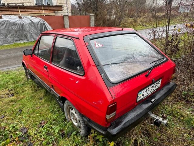 Красный Форд Фиеста, объемом двигателя 1.3 л и пробегом 300 тыс. км за 663 $, фото 6 на Automoto.ua