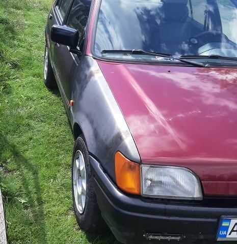 Красный Форд Фиеста, объемом двигателя 1.4 л и пробегом 200 тыс. км за 1100 $, фото 7 на Automoto.ua