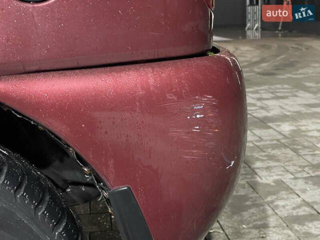 Красный Форд Фиеста, объемом двигателя 1.1 л и пробегом 300 тыс. км за 1100 $, фото 6 на Automoto.ua