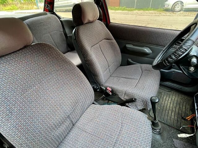 Красный Форд Фиеста, объемом двигателя 1.1 л и пробегом 210 тыс. км за 750 $, фото 11 на Automoto.ua