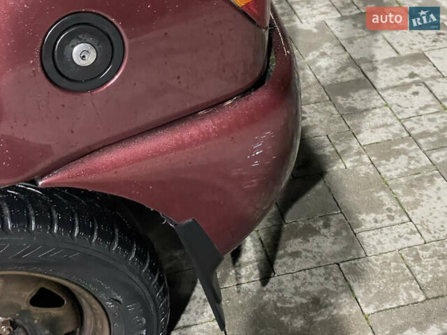 Красный Форд Фиеста, объемом двигателя 1.1 л и пробегом 300 тыс. км за 1100 $, фото 7 на Automoto.ua