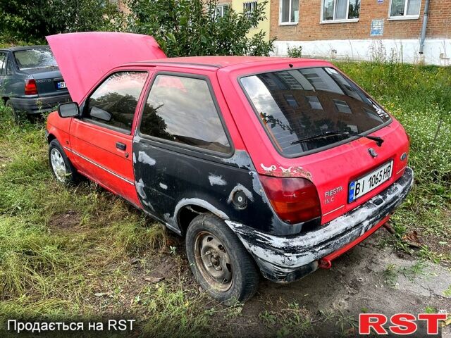 Красный Форд Фиеста, объемом двигателя 1.1 л и пробегом 210 тыс. км за 750 $, фото 9 на Automoto.ua