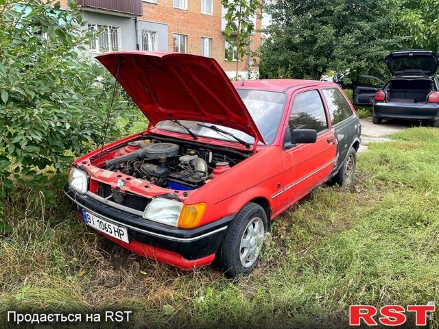 Красный Форд Фиеста, объемом двигателя 1.1 л и пробегом 210 тыс. км за 750 $, фото 1 на Automoto.ua