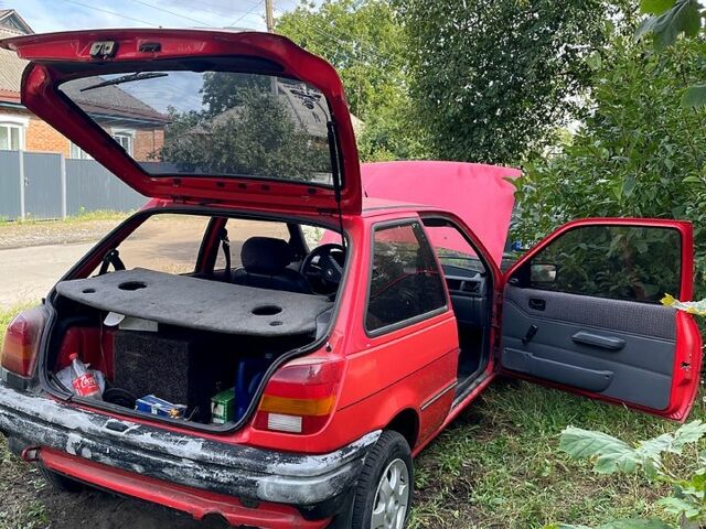 Красный Форд Фиеста, объемом двигателя 1.1 л и пробегом 210 тыс. км за 750 $, фото 5 на Automoto.ua