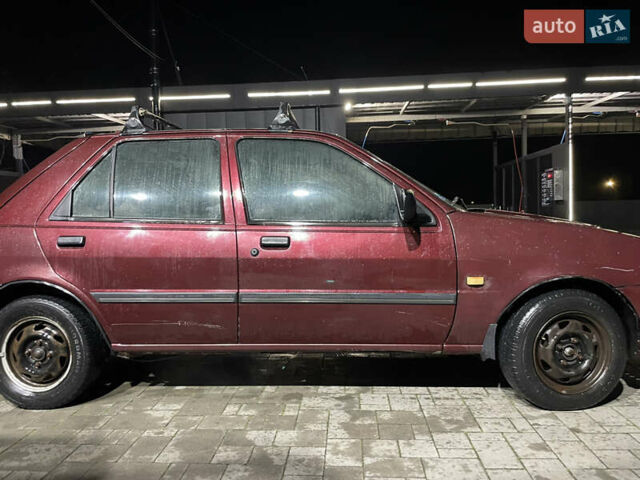 Красный Форд Фиеста, объемом двигателя 1.1 л и пробегом 300 тыс. км за 1100 $, фото 3 на Automoto.ua