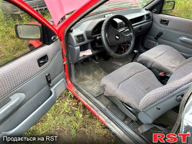 Красный Форд Фиеста, объемом двигателя 1.1 л и пробегом 210 тыс. км за 750 $, фото 8 на Automoto.ua