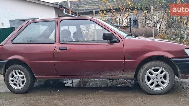Красный Форд Фиеста, объемом двигателя 1.12 л и пробегом 100 тыс. км за 1066 $, фото 2 на Automoto.ua
