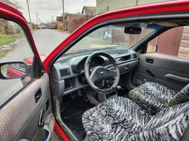 Красный Форд Фиеста, объемом двигателя 1.1 л и пробегом 345 тыс. км за 650 $, фото 6 на Automoto.ua