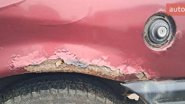 Красный Форд Фиеста, объемом двигателя 1.12 л и пробегом 100 тыс. км за 1066 $, фото 9 на Automoto.ua