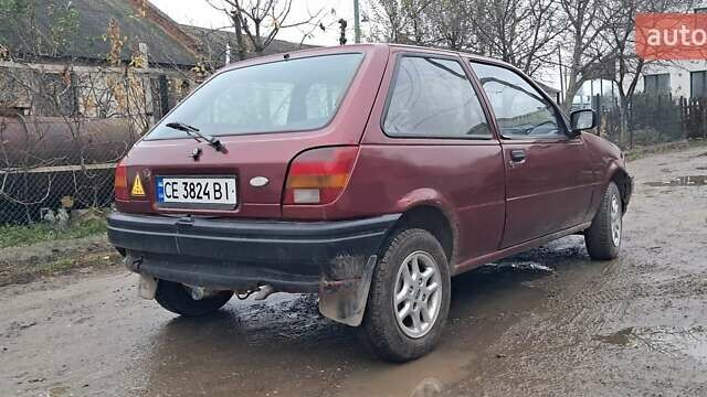 Красный Форд Фиеста, объемом двигателя 1.12 л и пробегом 100 тыс. км за 1066 $, фото 4 на Automoto.ua