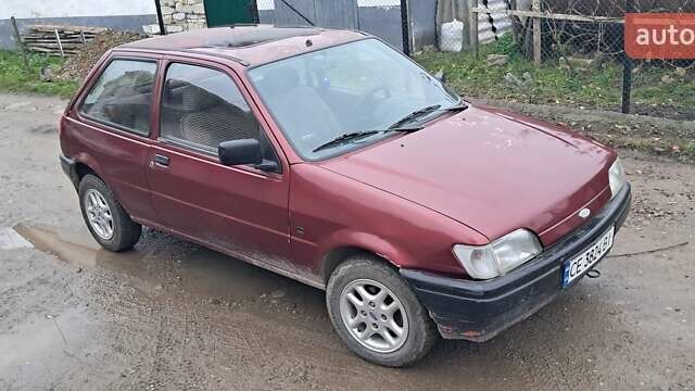 Красный Форд Фиеста, объемом двигателя 1.12 л и пробегом 100 тыс. км за 1066 $, фото 1 на Automoto.ua