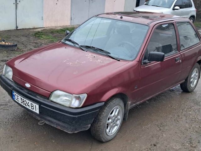 Красный Форд Фиеста, объемом двигателя 1.1 л и пробегом 100 тыс. км за 1070 $, фото 1 на Automoto.ua