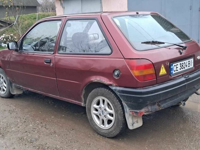 Красный Форд Фиеста, объемом двигателя 1.1 л и пробегом 100 тыс. км за 1070 $, фото 3 на Automoto.ua