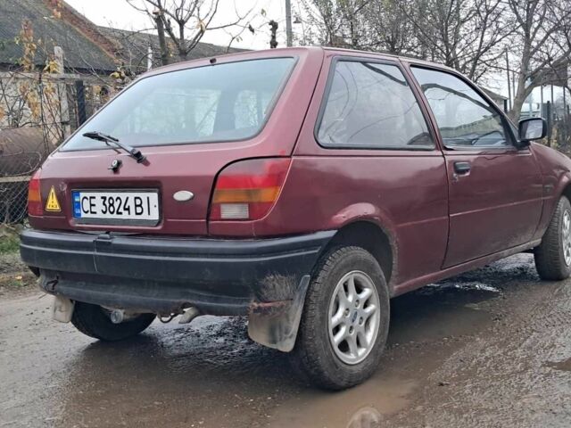 Красный Форд Фиеста, объемом двигателя 1.1 л и пробегом 100 тыс. км за 1070 $, фото 4 на Automoto.ua