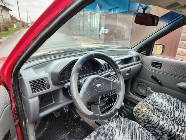 Красный Форд Фиеста, объемом двигателя 1.1 л и пробегом 345 тыс. км за 650 $, фото 7 на Automoto.ua