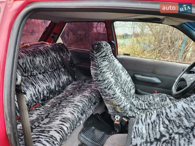 Красный Форд Фиеста, объемом двигателя 1.1 л и пробегом 358 тыс. км за 650 $, фото 9 на Automoto.ua