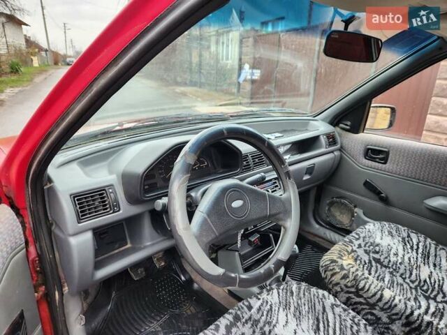 Красный Форд Фиеста, объемом двигателя 1.1 л и пробегом 358 тыс. км за 650 $, фото 8 на Automoto.ua