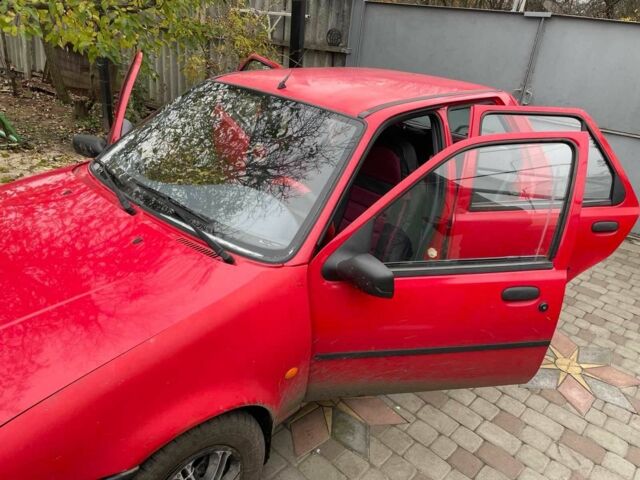 Красный Форд Фиеста, объемом двигателя 1.3 л и пробегом 200 тыс. км за 2200 $, фото 5 на Automoto.ua
