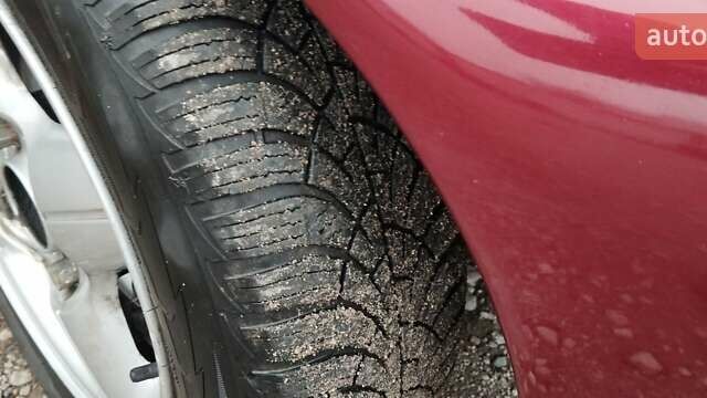 Красный Форд Фиеста, объемом двигателя 1.25 л и пробегом 260 тыс. км за 1550 $, фото 7 на Automoto.ua