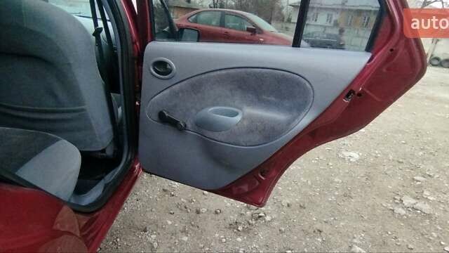 Красный Форд Фиеста, объемом двигателя 1.25 л и пробегом 260 тыс. км за 1550 $, фото 13 на Automoto.ua