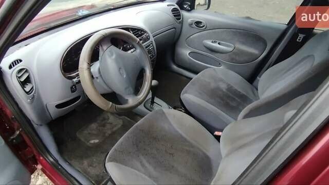 Красный Форд Фиеста, объемом двигателя 1.25 л и пробегом 260 тыс. км за 1550 $, фото 11 на Automoto.ua