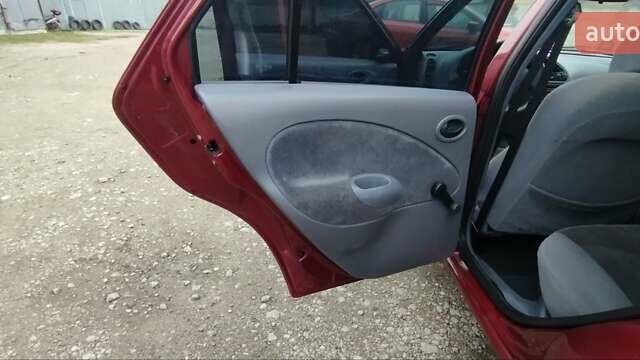 Красный Форд Фиеста, объемом двигателя 1.25 л и пробегом 260 тыс. км за 1550 $, фото 9 на Automoto.ua