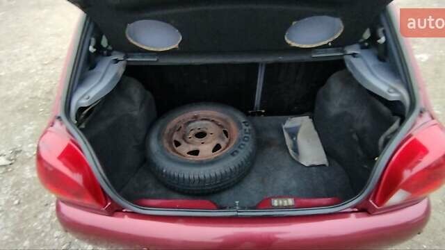 Красный Форд Фиеста, объемом двигателя 1.25 л и пробегом 260 тыс. км за 1550 $, фото 15 на Automoto.ua